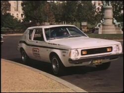 AMC Gremlin parked near front of U.S. Capitol Bldg Stock Footage
