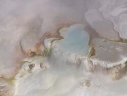 CU AERIAL ZO Shot of steam coming through Mammoth Springs / Wyoming, United States Stock Footage