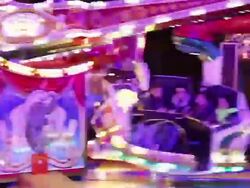 MS TS Shot of People enjoying amusement ride at funfair, flying bobs / Cologne, Germany Stock Footage