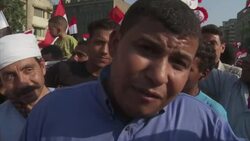 Protesters in Tahrir Square, military flyovers, Morsi supporters continue sit in News Clip