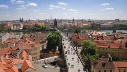 Pedestrians cross the Charles Bridge in Prague. Stock Footage