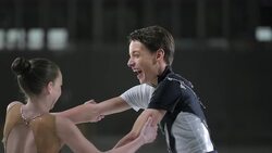 SLO MO LD Figure skating pair spinning and laughing Stock Footage