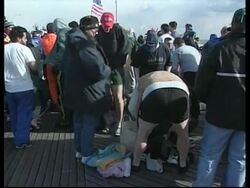 USA: POLAR BEAR CLUB MEMBERS DIVE INTO ICY WATERS News Clip