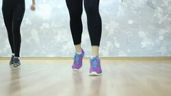 Fitness instructor exercising with a group Stock Footage