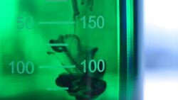 Dropping black liquid into eppendorf from autopipette. Stock Footage