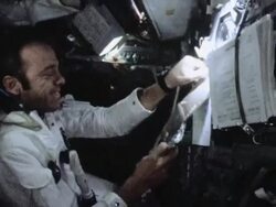 Apollo 14 crew floating in space capsule Stock Footage