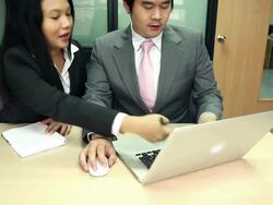 Dolly: Businesswoman Working laptop with manager coaching Stock Footage