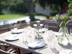 Table with luxury place settings in backyard Stock Footage