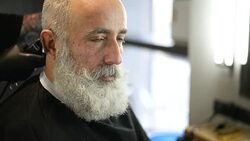 brutal barber clipper mows bearded adult senior hipster Stock Footage