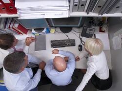 HD CRANE: Teamwork In The Office Stock Footage