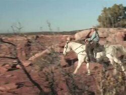 MS TS Women Riding Horses into Spectaculair Red Rock Mountains, Majestic Western Landscapes / Telluride, Colorado, United States   Stock Footage