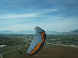 WS PAN POV Young man paragliding mid-air / Lehi, Utah, USA. Stock Footage