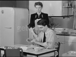 1948: CLAUDIA RADIO SHOW: DRAMATIZATION: Kathyrn Bard & Paul Crabtree ON SET kitchen, SOT 'David' (Paul Crabtree) w/ check book, 'Claudia' (Kathyrn Bard) walking to fridge, taking out bottle of soda, Coca-Cola shape, no label, product placement. Instructional Video
