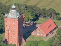 AERIAL MS View of lighhouse / Neuwerk, Schleswig-Holstein, Germany Stock Footage