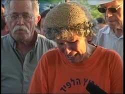 Reburials of loved ones upset settlers who are leaving Instructional Video