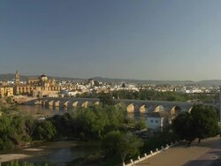 WS Roman bridge, Guadalquivir river and Cathedral-Mosque on left Stock Footage