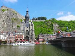 WS Shot od river Meuse, church Notre Dame and Citadelle of Dinant / Dinant, Wallonia, Belgium Stock Footage