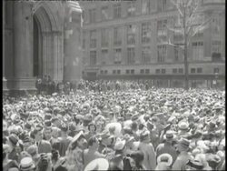 Women wear a variety of fanciful bonnets on Easter Sunday. News Clip