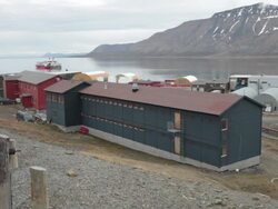 Two passenger cruise ships at the port of Longyearbyen on Adventfjorden in Svalbard archipelago Stock Footage