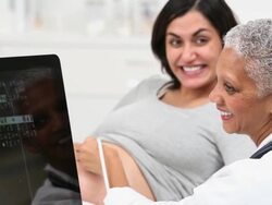 MS DS Doctor Performing Sonogram on Pregnant Woman / Richmond, Virginia, USA Stock Footage