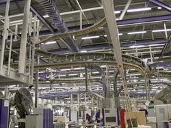 WS Magazines passing on conveyor belt in gravure printing office / Itzehoe, Schleswig-Holstein, Germany  Stock Footage