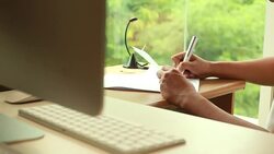 Businessman working at office desk Stock Footage