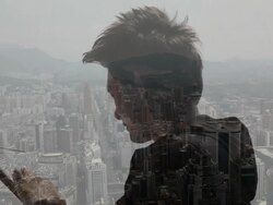 Composite image of man using tablet device and city Stock Footage