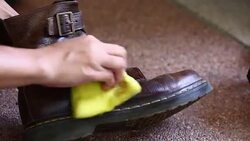 cleaning shoe Stock Footage