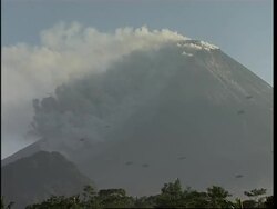 Rumbling Mount Merapi appears quieter, but danger still exists News Clip