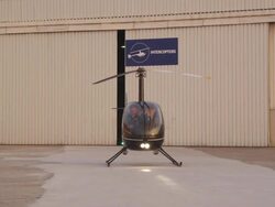 pilot starting engine of light helicopter and spinning up rotor, RED R3D 4K Stock Footage