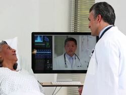 MS Doctors Video Conferencing with Patient in Hospital / Richmond, Virgnia, United States Stock Footage