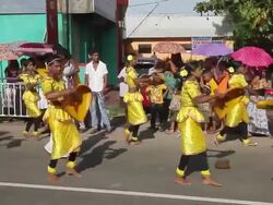 MS Women in colourful traditional costumes parade in Buddhist Perahera Festival in Hikkaduwa AUDIO / Hikkaduwa, Southern Province, Sri Lanka Stock Footage