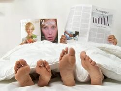 Reading In Bed Stock Footage