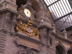 A decorative clock marks the time on a train station wall. Stock Footage