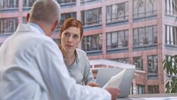 DS Project manager in meeting with female company analyst Stock Footage