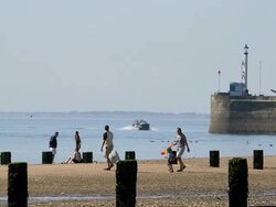 BRIDLINGTON NORTH BEACH HARBOUR WALL AND LIGHTHOUSE Stock Footage