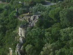 MS DS AERIAL Shot of Kaisers Throne surrounded by trees / Corfu, Ionian Islands, Greece Stock Footage