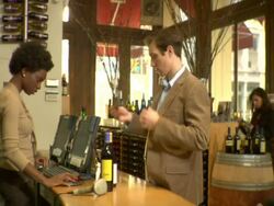 MS, Man buying wine in liquor shop, Soho, New York City, New York, USA Stock Footage
