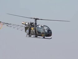 WS South African Airforce Alouette II Helicopter hovering in sky / Johannesburg, Gauteng, South Africa Stock Footage