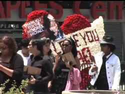 Fans of Michael Jackson say they were overcome with emotion during today's memorial service at the Staples Center in Los Angeles.  AP Correspondent Haven Daley spoke to several people who attended the tribute as they filed out of the arena News Clip