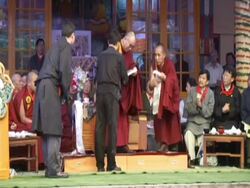 WS Accepting gifts and offering katags at Dalai Lama's 70th birthday AUDIO / Dharmasala, Himachal Pradesh, India Stock Footage