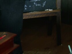 Miniaturised late Victorian scene, school, Dolls house, Leonardslee Gardens, West Sussex, UK Stock Footage