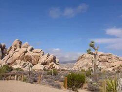 Leaving Hall of Horrors in Joshua Tree National Park Stock Footage