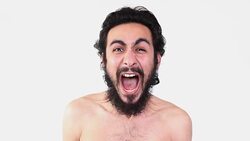 Screaming naked man against white background Stock Footage