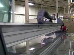 Close Up static - A chain drive contracts and expands on a glass cutter /  Wisconsin, United States Stock Footage