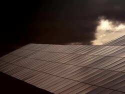 HD Solar Park in Front of Dramatic Sky Time Lapse Stock Footage