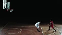 SLO MO of two players playing in free throw lane Stock Footage