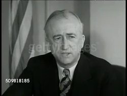 1944: U.S. WHITE HOUSE COUNSELOR: EXT MS White House Executive Wing, trees. REPRISAL: INT VS House Counselor James F. Byrnes (1879-1972) at desk dictating to secretary '...we were not prepared for war, we must be prepared for peace.' Washington D.C. Instructional Video