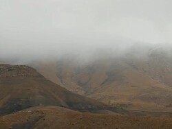 WS View of atlas mountain valley with foggy skies / Marrakech, Tensift, Morocco  Stock Footage