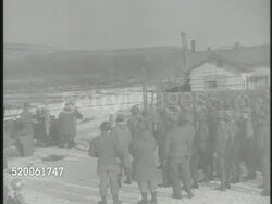1950: KOREAN WAR: HYESAN: WS Frozen Yalu River (between Manchuria & China), aka Amnok River. HA WS Hyesan city in North Korea. VS United States 7th Division Marines standing, listening to speech (no SOT). North Korea, 38th Parallel Instructional Video